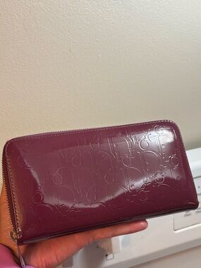 Christian Dior plum purple monogram Dior zippy wallet in beautiful condition